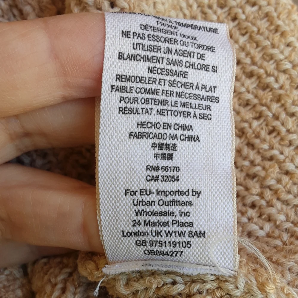 Free People Ochre Cozy V-neck Long Sleeve Knit Sweater.